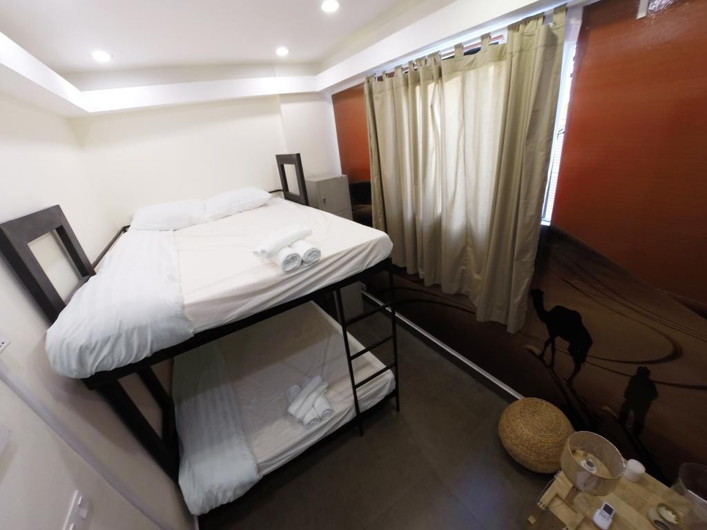 Aura Thematic Hostel Phnom Penh Chambre photo